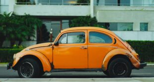 shallow focus photography of orange Volkswagen Beetle photo